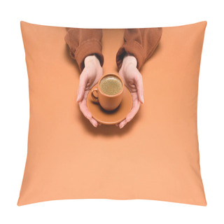 Personality  Cropped Shot Of Woman Holding Cup Of Coffee On Saucer In Hands Isolated On Peach Pillow Covers