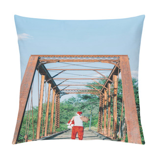 Personality  Man Dressed As Santa Claus Walking On An Old Bridge, Christmas Concept, Man Works As Santa Claus Pillow Covers