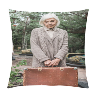 Personality  PRIPYAT, UKRAINE - AUGUST 15, 2019: Sad Senior Woman Holding Suitcase In Amusement Park  Pillow Covers