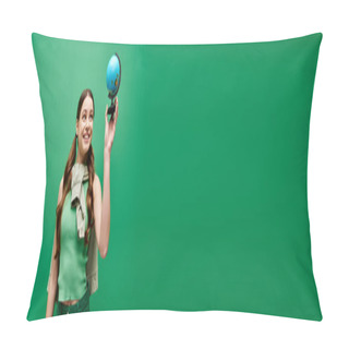 Personality  A Young, Beautiful Woman In Her 20s Holding A Vibrant Blue Globe With Curiosity And Wonder In A Studio Setting On A Green Backdrop. Pillow Covers