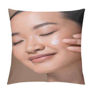 Personality  Close Up View Of Pretty Asian Woman Applying Face Cream And Closing Eyes Isolated On Brown  Pillow Covers