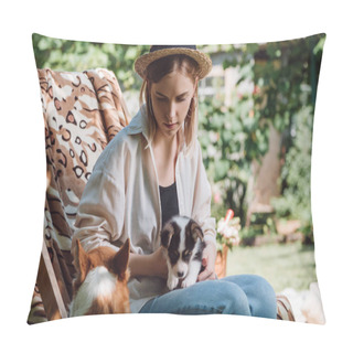 Personality  Blonde Girl In Straw Hat Holding Puppy Near Welsh Corgi Dog While Sitting In Deck Chair In Garden Pillow Covers