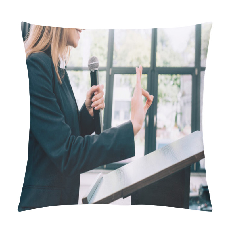 Personality  cropped image of lecturer showing okay gesture at podium tribune during seminar in conference hall pillow covers