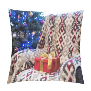Personality  Red Gift Box With Golden Bow On Couch And Decorated Christmas Tree Behind  Pillow Covers