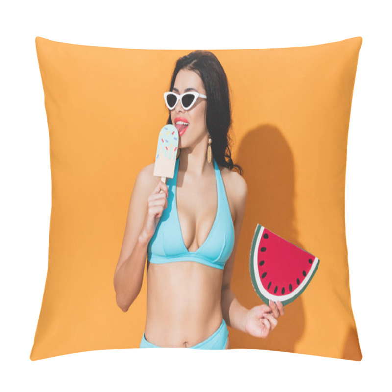 Personality  young woman in swimsuit licking paper ice cream and holding watermelon on orange  pillow covers