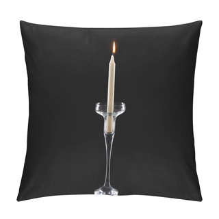 Personality  Burning White Candle Glowing In Glass Candlestick Isolated On Black Pillow Covers