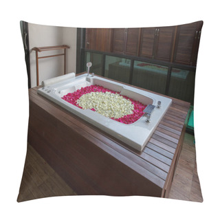 Personality  A Relaxing Bath With Rose. Bath Tub With Floating Petals. Rose Petals Put In Bathtub For Romantic Bathroom In Honeymoon Suit. Arranged By Interior Designer For Honeymoon Couple. Pillow Covers