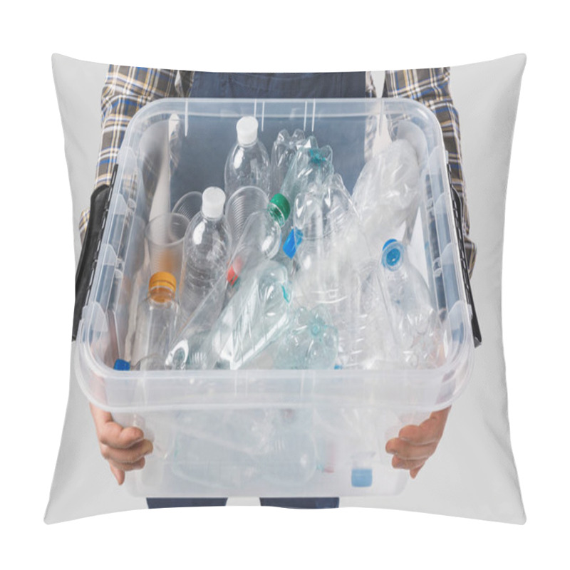 Personality  partial view of man holding container with plastic bottles in hands isolated on grey, recycling concept pillow covers