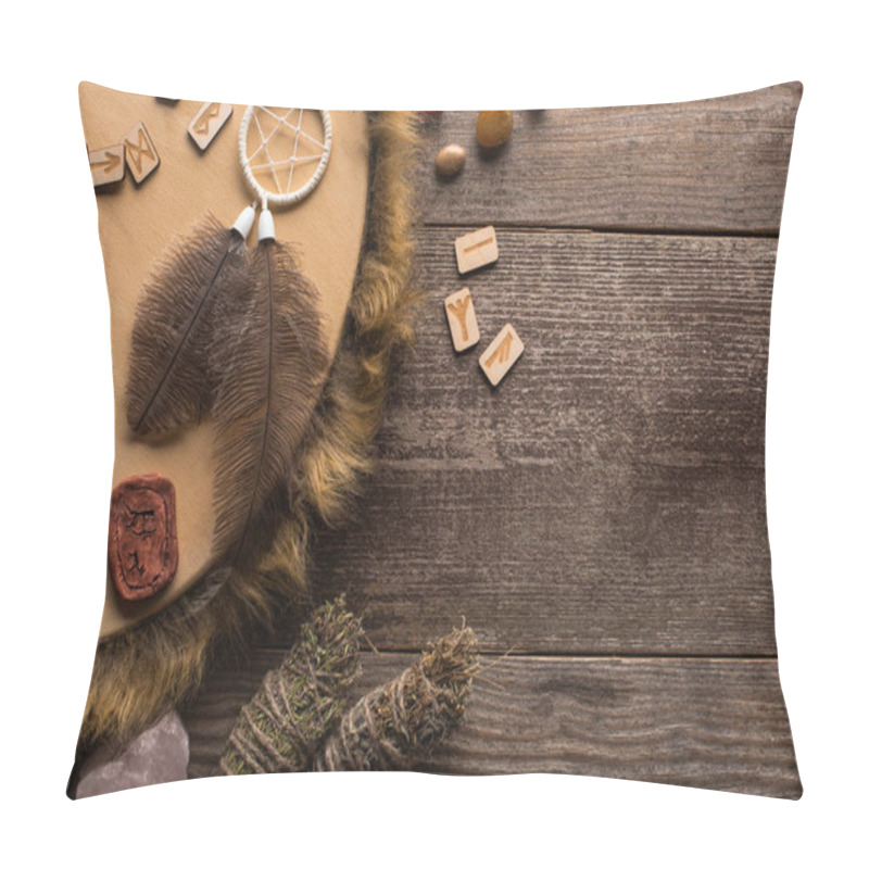 Personality  Top view of tambourine, dreamcatcher with smudge sticks and crystals on wooden background pillow covers