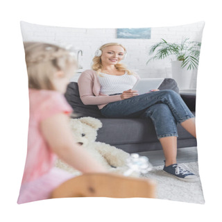 Personality  Happy Woman Looking At Blurred Daughter While Sitting On Sofa In Headphones Pillow Covers