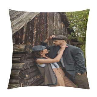 Personality  Fashionable Woman In Vintage Vest And Suspenders Touching Shoulder Of Bearded Boyfriend In Jacket And Newsboy Cap While Standing Near Rural House, Stylish Couple In Rural Setting Pillow Covers
