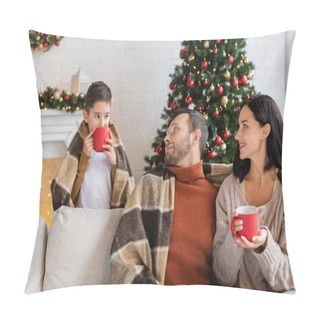 Personality  Kid Drinking Warm Cocoa Near Christmas Tree And Parents Sitting On Couch Under Warm Blanket Pillow Covers