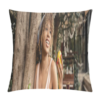 Personality  Young And Trendy African American Woman With Braces And Summer Outfit Holding Ripe Lemon And Standing Near Trees In Garden Center, Fashion-forward Lady In Harmony With Tropical Flora, Banner  Pillow Covers
