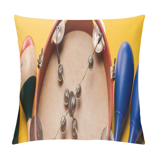 Personality  Close Up View Of Tambourine Near Colorful And Blue Maracas On Yellow Background, Panoramic Shot Pillow Covers