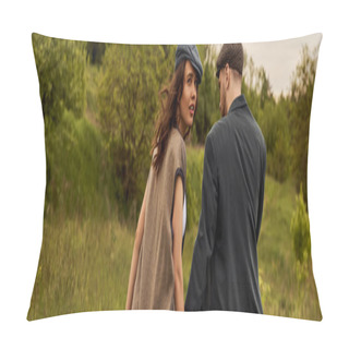 Personality  Trendy Brunette Woman In Vest And Newsboy Cap Looking At Camera While Walking Near Boyfriend In Jacket With Blurred Landscape At Background, Stylish Couple In Rural Setting, Banner  Pillow Covers