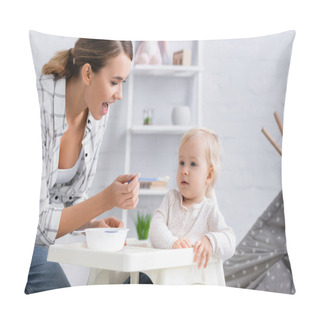 Personality  Young Mother With Open Mouth Feeding Baby Boy Sitting On Kids Chair Pillow Covers