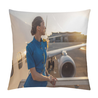 Personality  Thoughtful Air Stewardess In Blue Uniform Looking Away, Standing Outdoors At The Sunset. Commercial Airplane Near Terminal In An Airport In The Background Pillow Covers