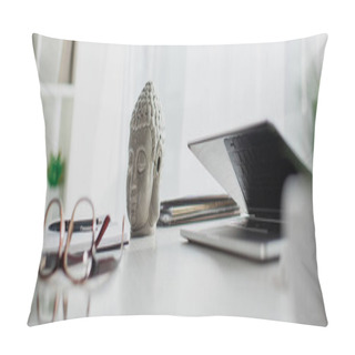 Personality  Panoramic Shot Of Buddha Head, Eyeglasses And Laptop On Table In Modern Office Pillow Covers