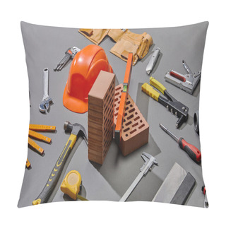 Personality  High Angle View Of Helmet, Bricks And Industrial Tools On Grey Background Pillow Covers