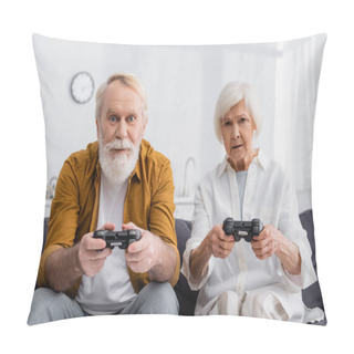 Personality  KYIV, UKRAINE - DECEMBER 17, 2020: Elderly Couple Playing Video Game At Home  Pillow Covers