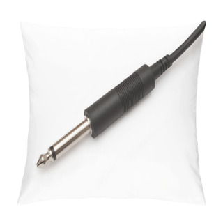 Personality  Close Up Capturing A Single Jack Plug Arranged Over White Pillow Covers