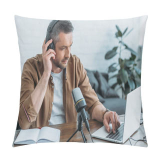 Personality  Attentive Radio Host In Headphones Using Laptop While Sitting Near Microphone Pillow Covers