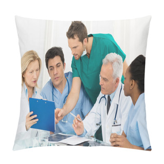Personality  Team Of Doctors Examining Reports Pillow Covers