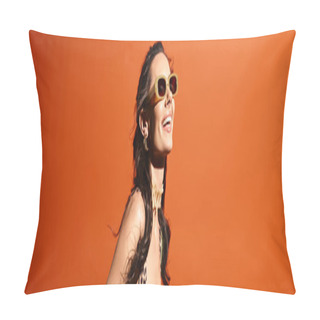 Personality  A Stylish Woman In A Leopard Print Dress And Sunglasses Poses Confidently In A Studio Against An Orange Background. Pillow Covers