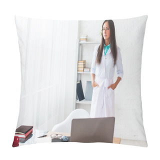 Personality  Portrait Of Young Woman Doctor With White Coat Standing In Medical Office Looking At The Camera. Pillow Covers