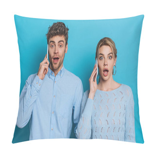 Personality  Surprised Man And Woman Looking At Camera While Talking On Smartphones On Blue Background Pillow Covers