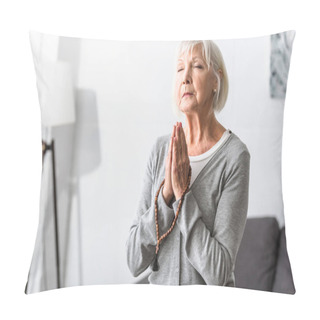 Personality  Senior Woman Holding Wooden Rosary And Praying With Closed Eyes Pillow Covers