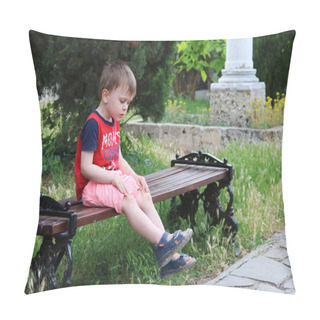 Personality  A Three Year Old Boy With Fair Hair In A Red T-shirt And Pink Shorts Is Sitting On A Bench In The Park.  Pillow Covers