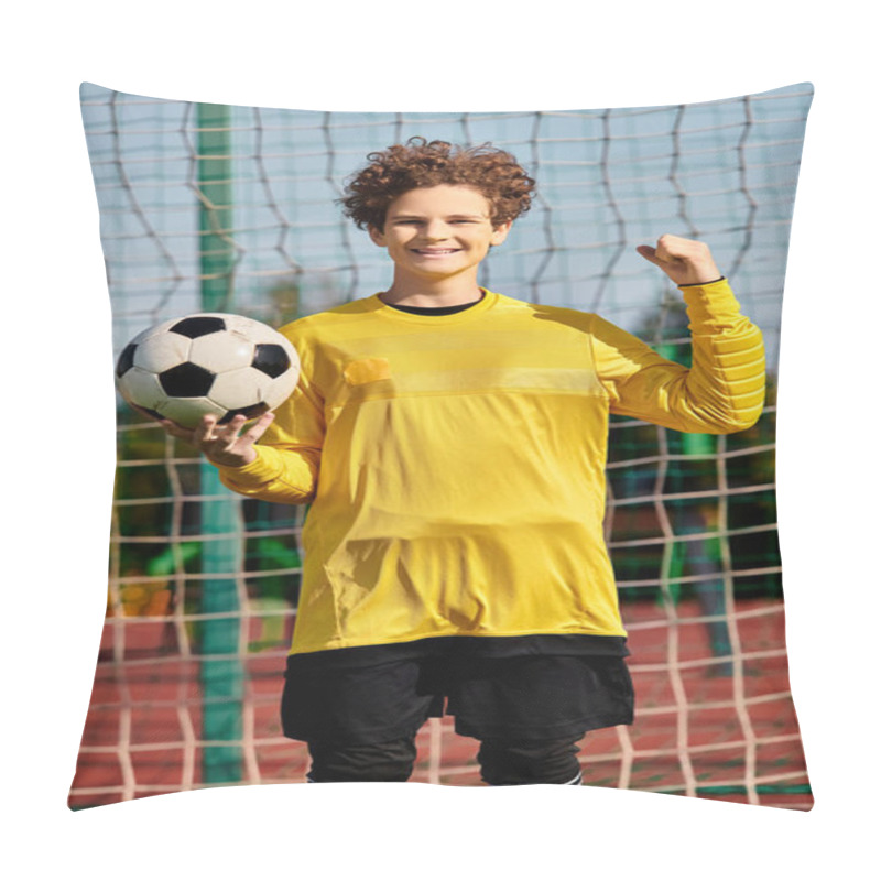 Personality  A Young Boy Stands In Front Of A Soccer Net, Holding A Soccer Ball In His Hands, With A Look Of Determination On His Face. Pillow Covers