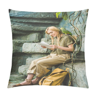 Personality  Happy Young Woman In Safari Suit With Parrot On Shoulder And Map Sitting On Rocks Pillow Covers