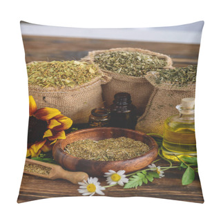 Personality  Wooden Bowl And Sackcloth Bags With Dried Herbs, Bottles With Essential Oils, Sunflower And Chamomile Flowers On Wooden Surface Pillow Covers