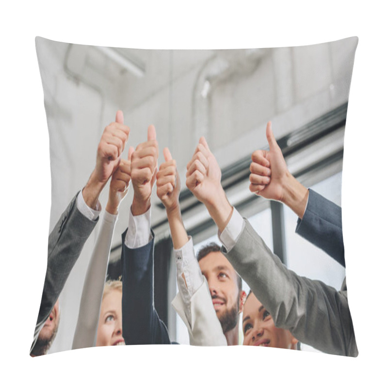 Personality  low angle view of smiling businesspeople showing thumbs up in hub pillow covers
