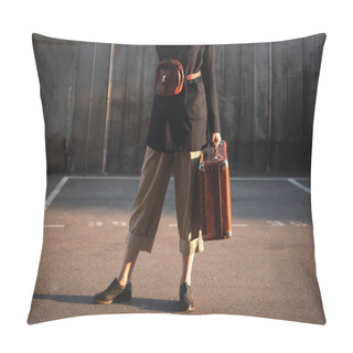 Personality  Cropped View Of Stylish Girl With Belt Bag Holding Retro Suitcase On Urban Parking Pillow Covers