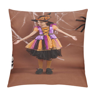 Personality  Positive Girl In Witch Costume And Pointed Hat Gesturing Near Sweets Bucket, Halloween Concept Pillow Covers