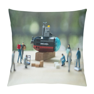 Personality  Miniature People Of Worker Loading Thing To Submarine On Wood Table With Nature Background. Selective Focus Pillow Covers