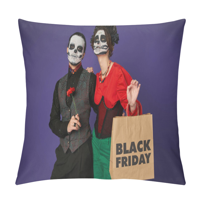 Personality  scary woman with black friday shopping bag looking away near man in sugar skull makeup on blue pillow covers