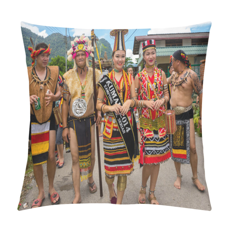 Personality  SARAWAK, MALAYSIA: JUNE 1, 2014: People of the Bidayuh tribe, an indigenous native people of Borneo, in traditional costumes, take part in a street parade to celebrate the Gawai Dayak festival. pillow covers