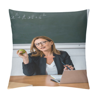 Personality  Female Teacher In Glasses Sitting At Computer Desk And Holding Apple In Classroom Pillow Covers