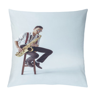 Personality  Handsome Young Jazzman Sitting On Stool And Playing Saxophone On Grey  Pillow Covers