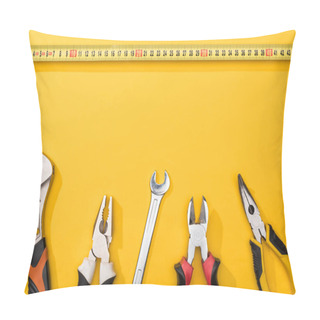 Personality  Top View Of Industrial Measuring Tape Near Wrenches And Pliers On Yellow Background Pillow Covers