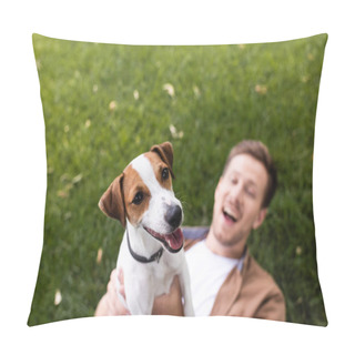 Personality  Selective Focus Of Excited Man Holding Jack Russell Terrier Dog While Lying On Green Lawn Pillow Covers