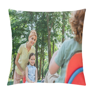 Personality  Woman Smiling Near Kids Riding Seesaw On Blurred Foreground Pillow Covers