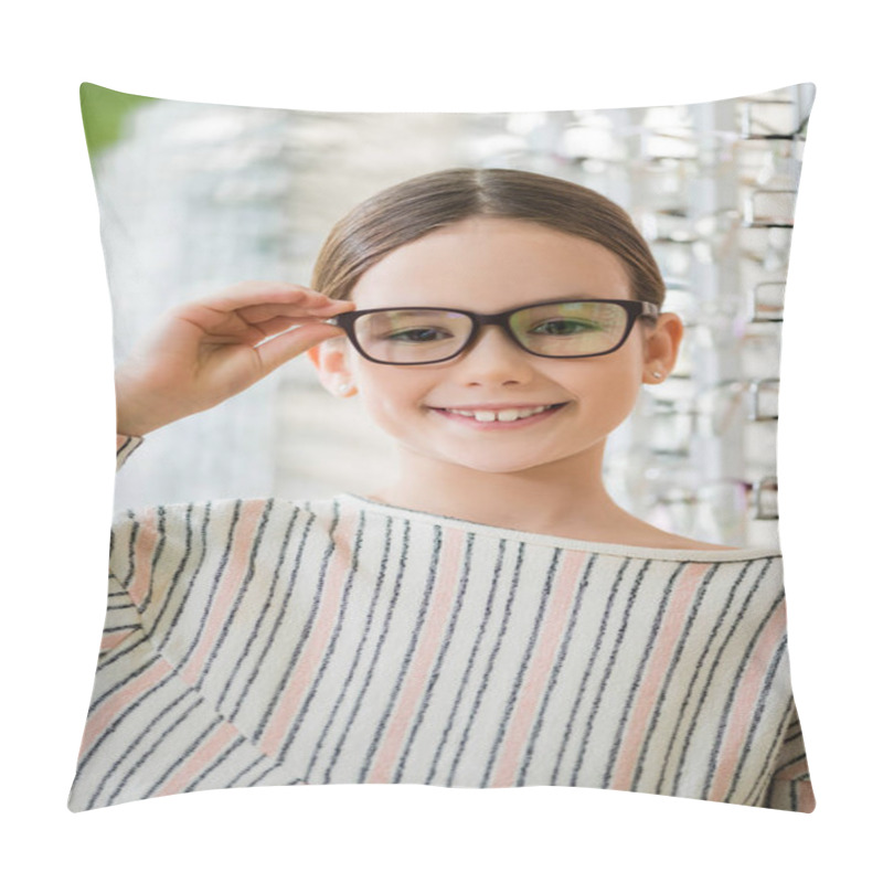 Personality  Pleased Child Looking At Camera While Trying On Eyeglasses In Optics Shop On Blurred Background Pillow Covers