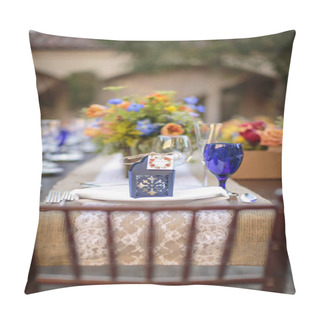 Personality  Table Set For A Patio Wedding Decorated With Orange And Yellow Flower, Blue And Crystal Wind Glasses On A Rustic Table In A Mission Style Patio Garden Pillow Covers