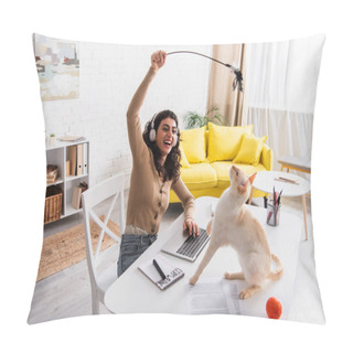 Personality  Smiling Freelancer In Headphones Playing With Oriental Cat Near Papers And Laptop At Home  Pillow Covers