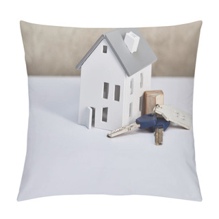 Personality  House Model On White Table With Keys Near Grey Textured Wall, Real Estate Concept Pillow Covers